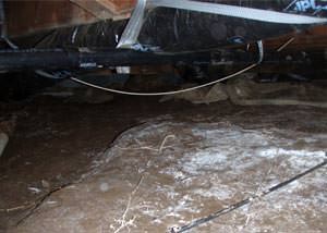 A musty, moldy, rotting dirt crawl space in Massillon that is in dire need of repairs